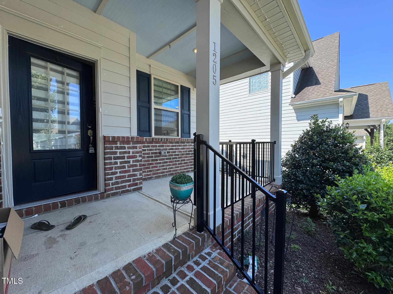 1205 Elliott Ridge Lane Morrisville, NC 27560 - Photo 28 of 32 a balcony view with a sink