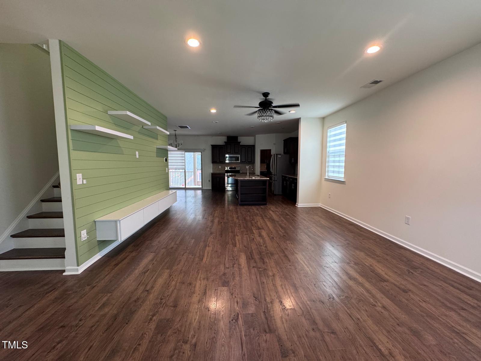 1205 Elliott Ridge Lane Morrisville, NC 27560 - Photo 8 of 32 a view of empty room with wooden floor