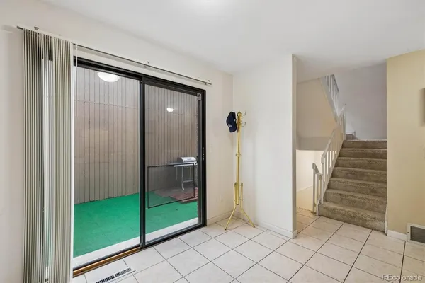 a view of an entryway with a glass door