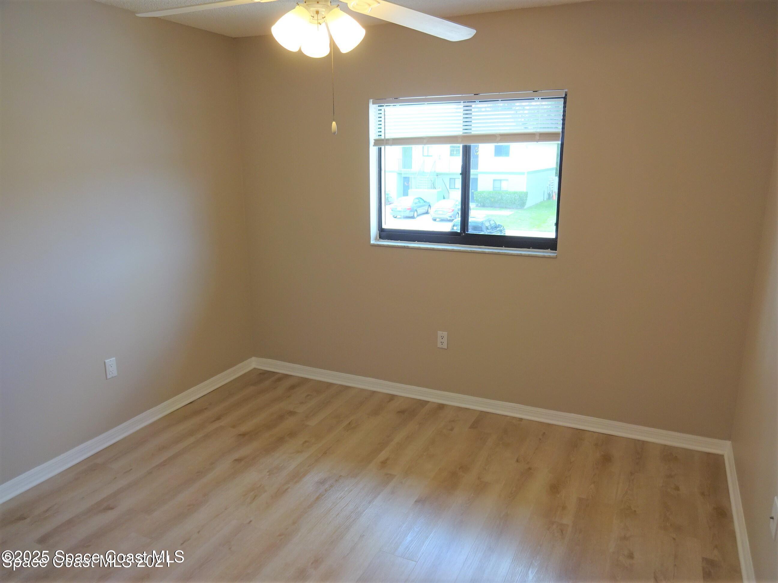 1720 Murrell Road, Unit 217 Rockledge, FL 32955 - Photo 16 of 24 an empty room with a window