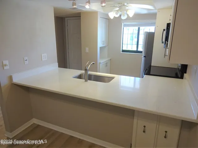 a bathroom with a sink a vanity and a mirror