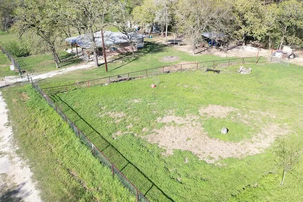 a view of a garden with an outdoor space