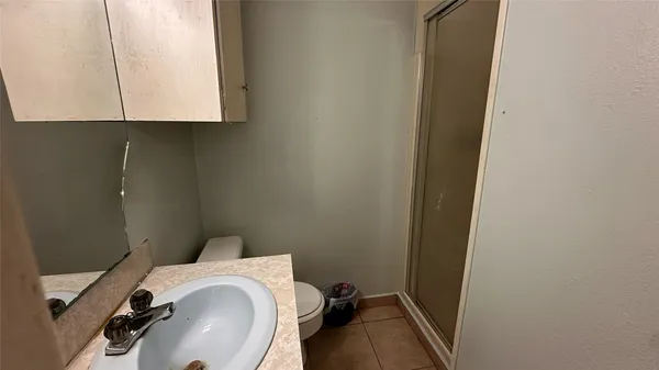 a bathroom with a sink and a toilet