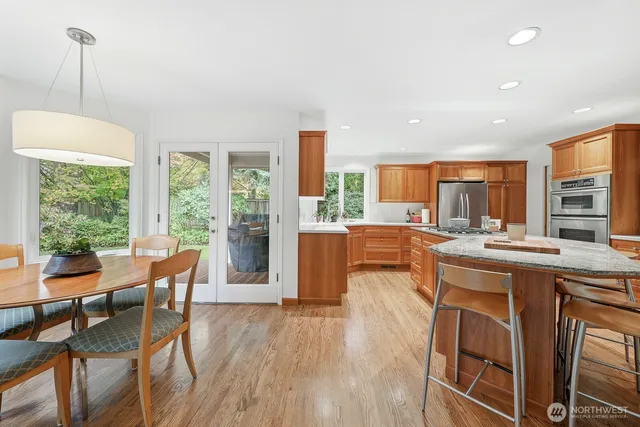a view of a dining room with furniture window and outside view