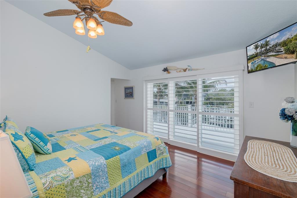 5040 Waterside Drive Port Richey, FL 34668 - Photo 18 of 58 a bedroom with a bed and a window