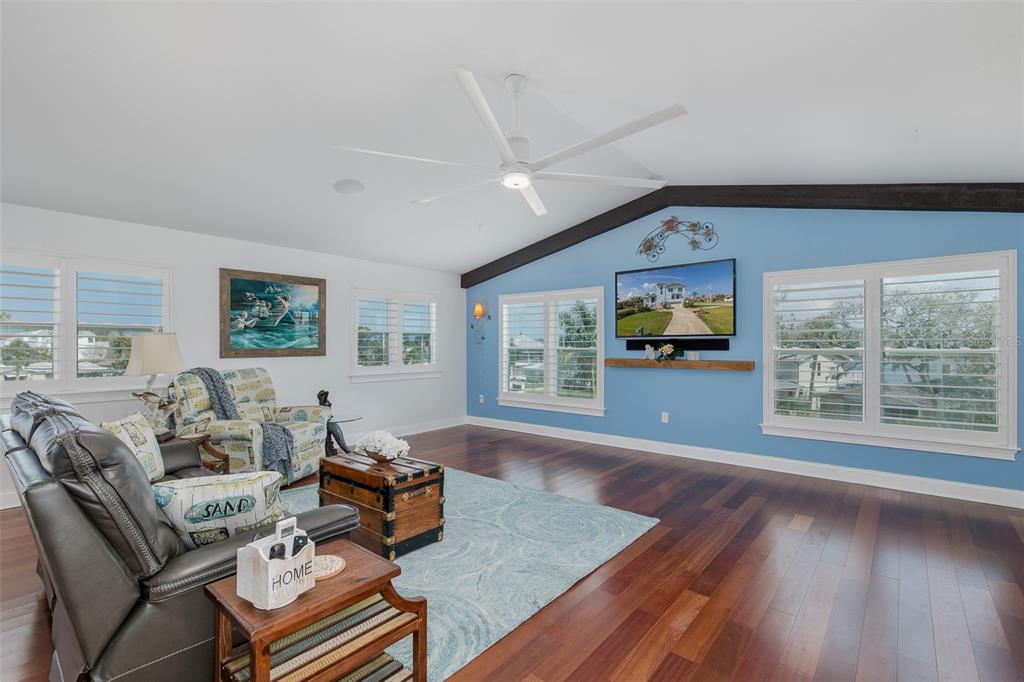 5040 Waterside Drive Port Richey, FL 34668 - Photo 33 of 58 a living room with furniture and a large window