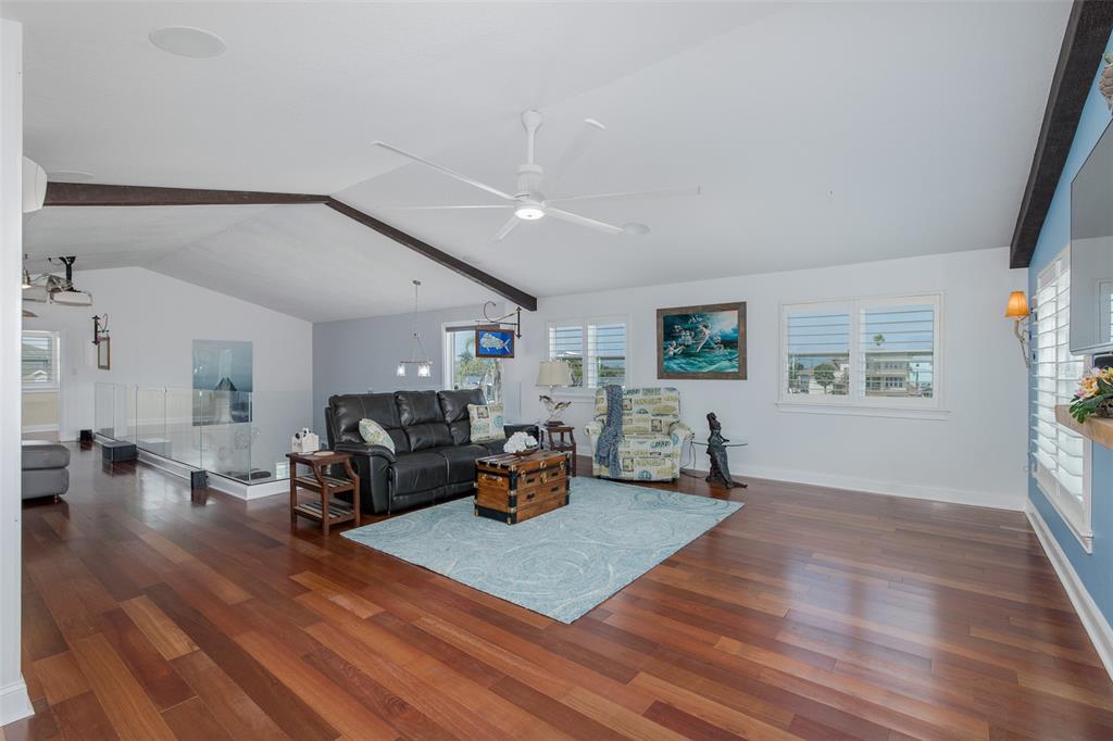 5040 Waterside Drive Port Richey, FL 34668 - Photo 34 of 58 a living room with furniture and a wooden floor