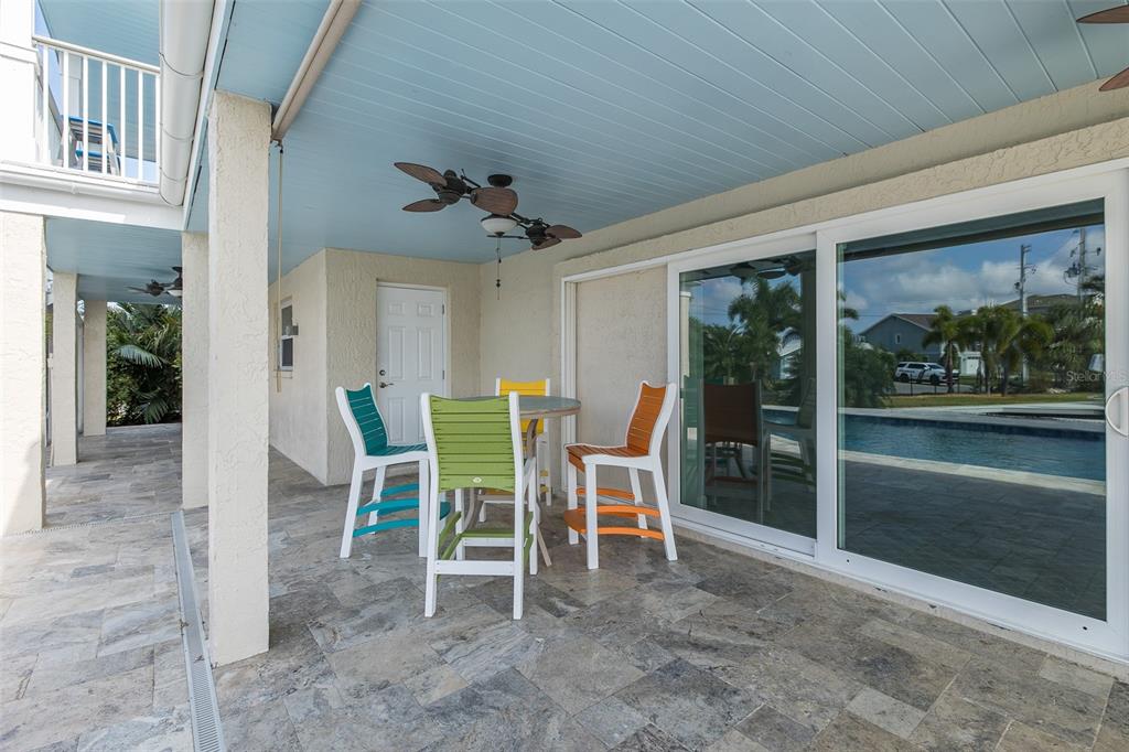 5040 Waterside Drive Port Richey, FL 34668 - Photo 37 of 58 a view of a dining room with furniture and window