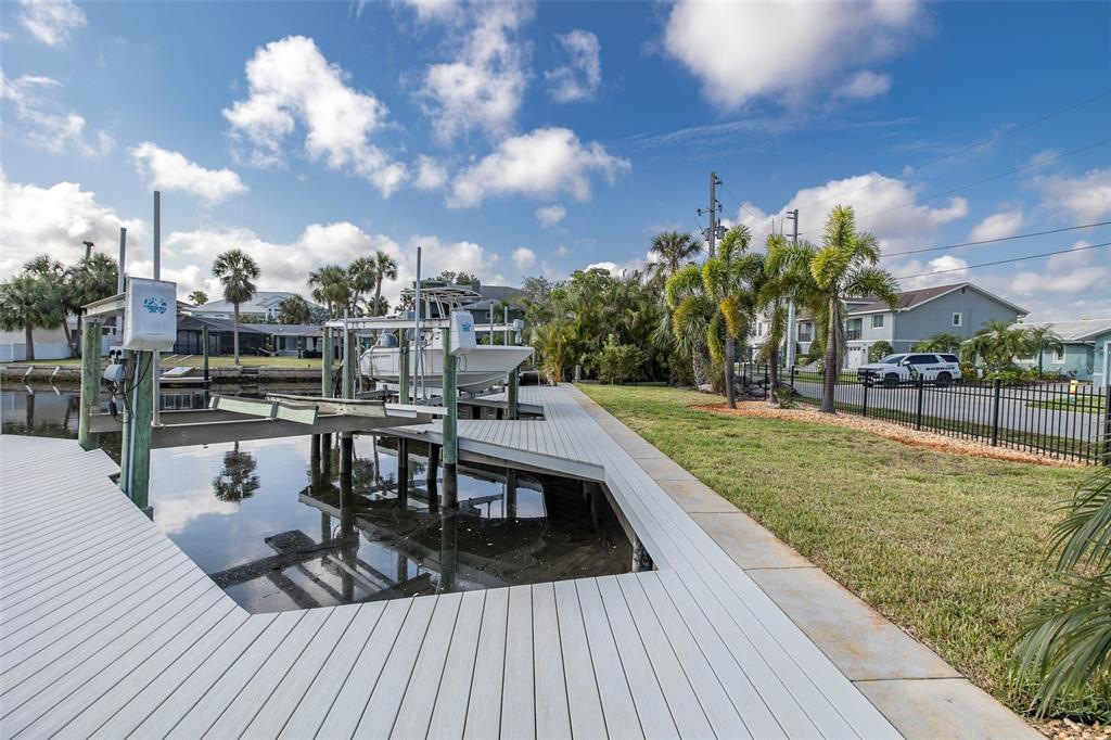5040 Waterside Drive Port Richey, FL 34668 - Photo 46 of 58 a view of a swimming pool with seating space