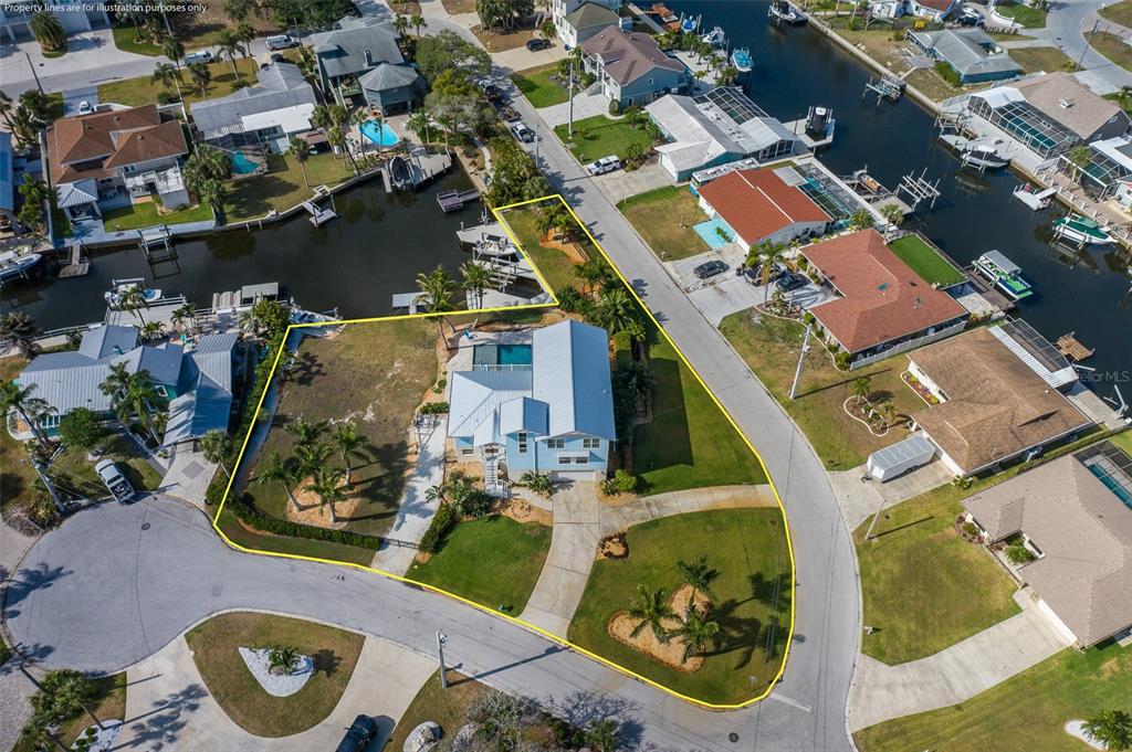 5040 Waterside Drive Port Richey, FL 34668 - Photo 55 of 58 an aerial view of a house a yard and mountain