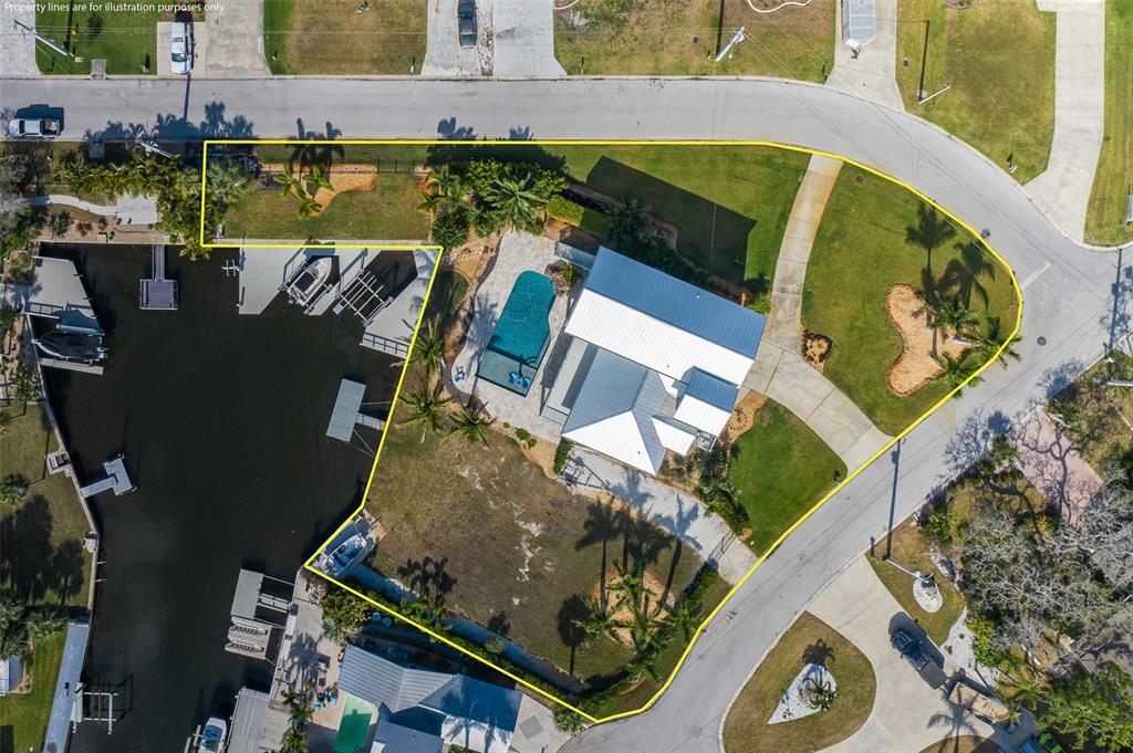5040 Waterside Drive Port Richey, FL 34668 - Photo 7 of 58 an aerial view of a house with a swimming pool
