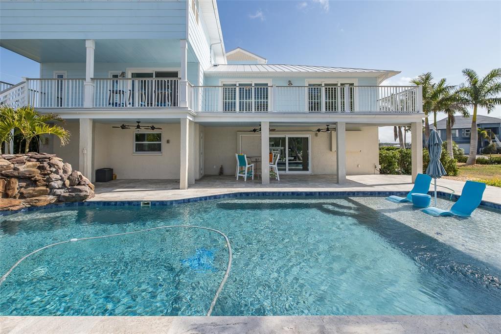 5040 Waterside Drive Port Richey, FL 34668 - Photo 8 of 58 a house view with a garden space