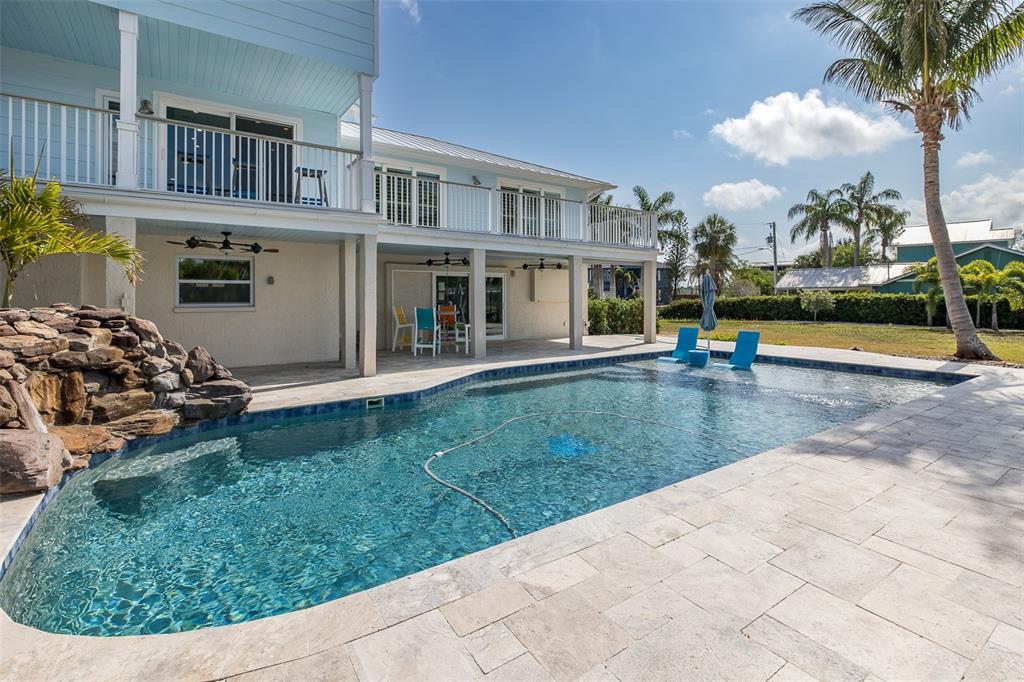 5040 Waterside Drive Port Richey, FL 34668 - Photo 9 of 58 a view of a house with swimming pool