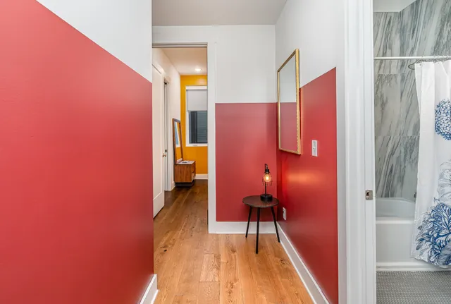 a view of a hallway with a furniture
