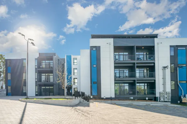 a front view of a building with street view