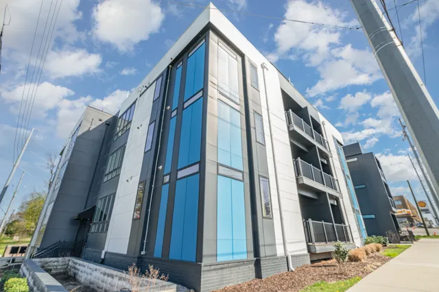 a view of a house with a street