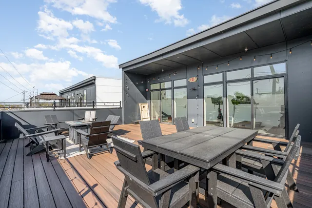 an outdoor space with furniture