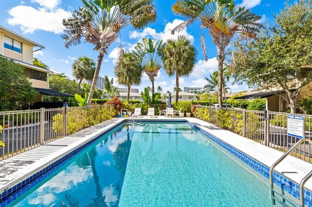 a view of swimming pool with a patio