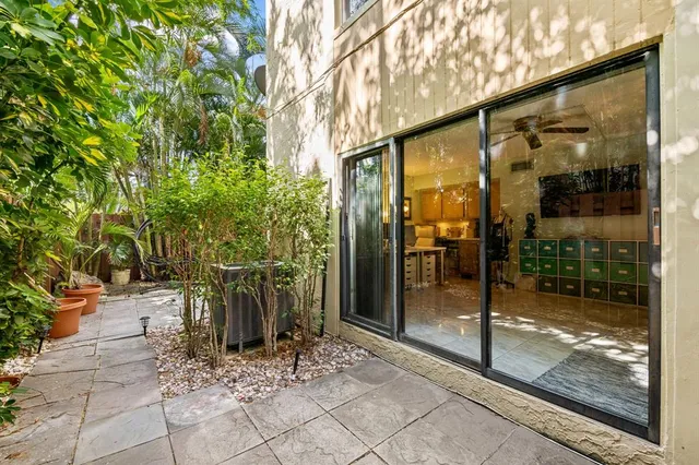 a view of a porch with a tree