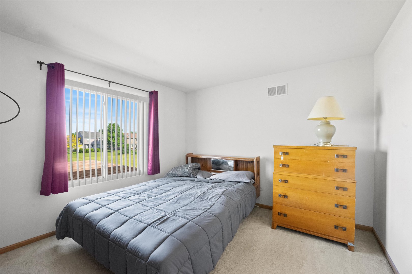 639 Chestnut Ridge Minooka, IL 60447 - Photo 16 of 31 a bedroom with a bed and a window