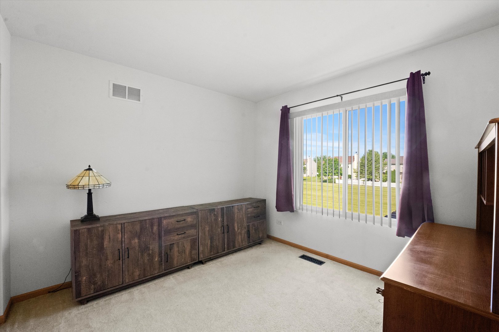 639 Chestnut Ridge Minooka, IL 60447 - Photo 21 of 31 a view of an empty room with a window