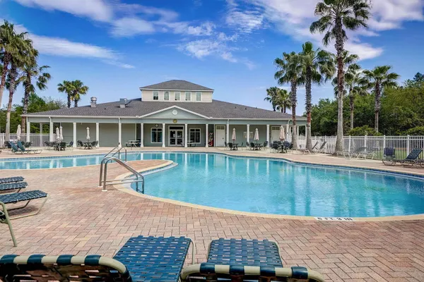 a view of a house with a swimming pool