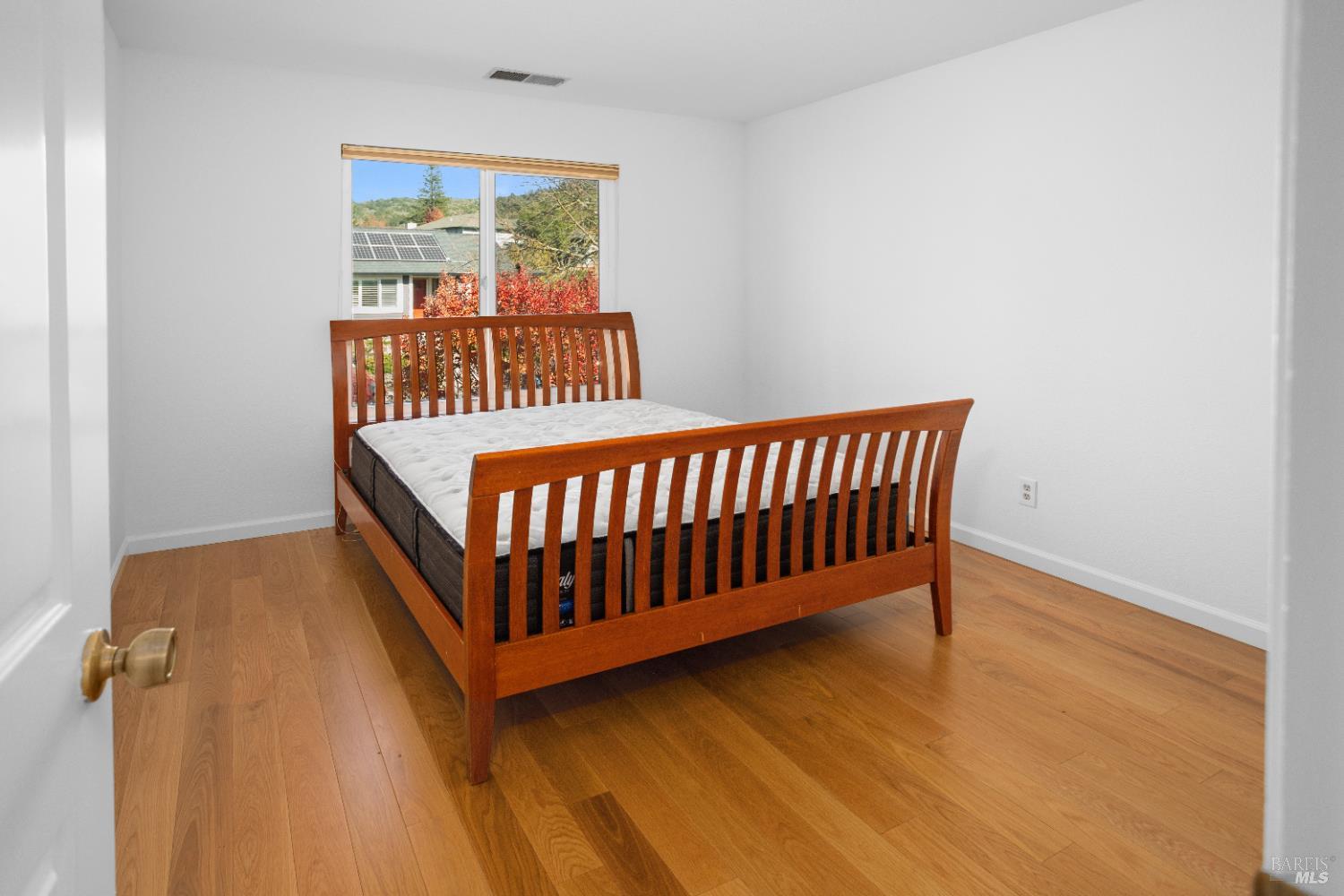 4808 Foxglove Court Santa Rosa, CA 95405 - Photo 15 of 26 a bedroom with a bed and a window