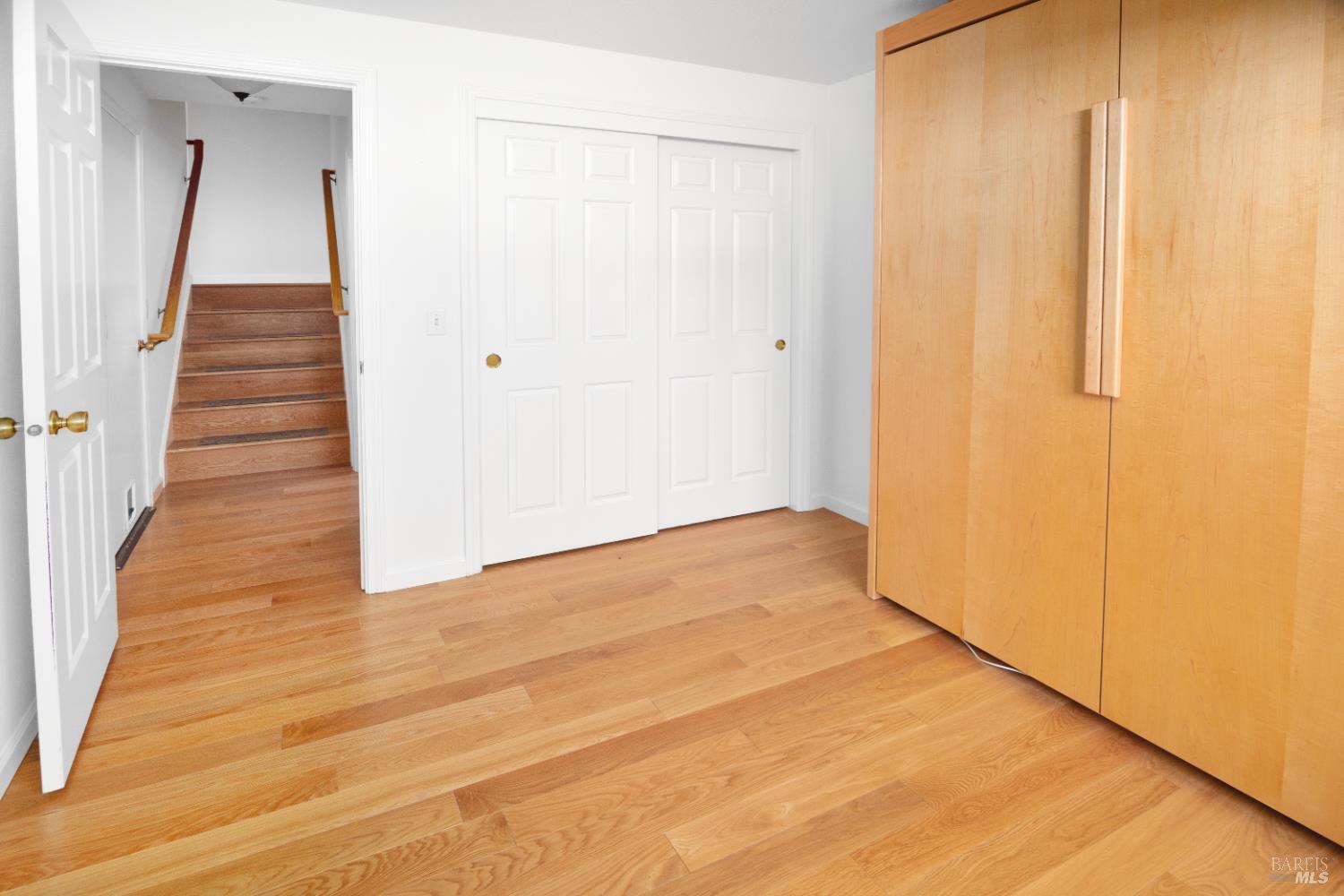 4808 Foxglove Court Santa Rosa, CA 95405 - Photo 17 of 26 a view of a hallway with wooden floor