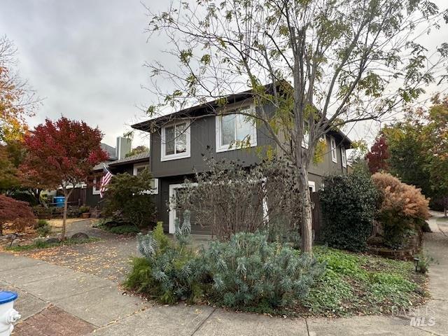 4808 Foxglove Court Santa Rosa, CA 95405 - Photo 26 of 26 a yellow house with trees in front of it