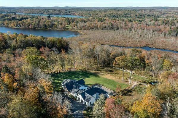 an aerial view of residential house with outdoor space