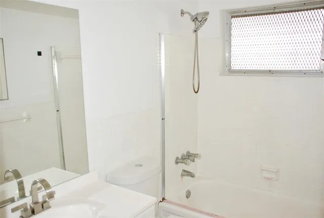 a view of a small space with wooden floor