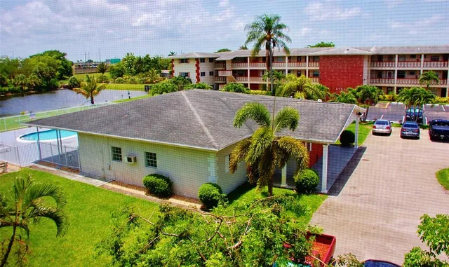a front view of a house having yard