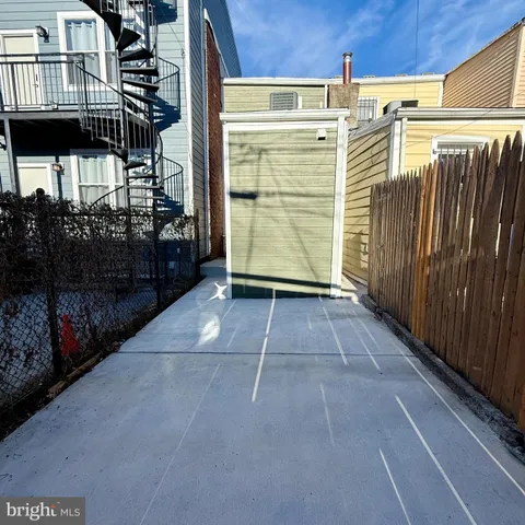 a view of a balcony with door
