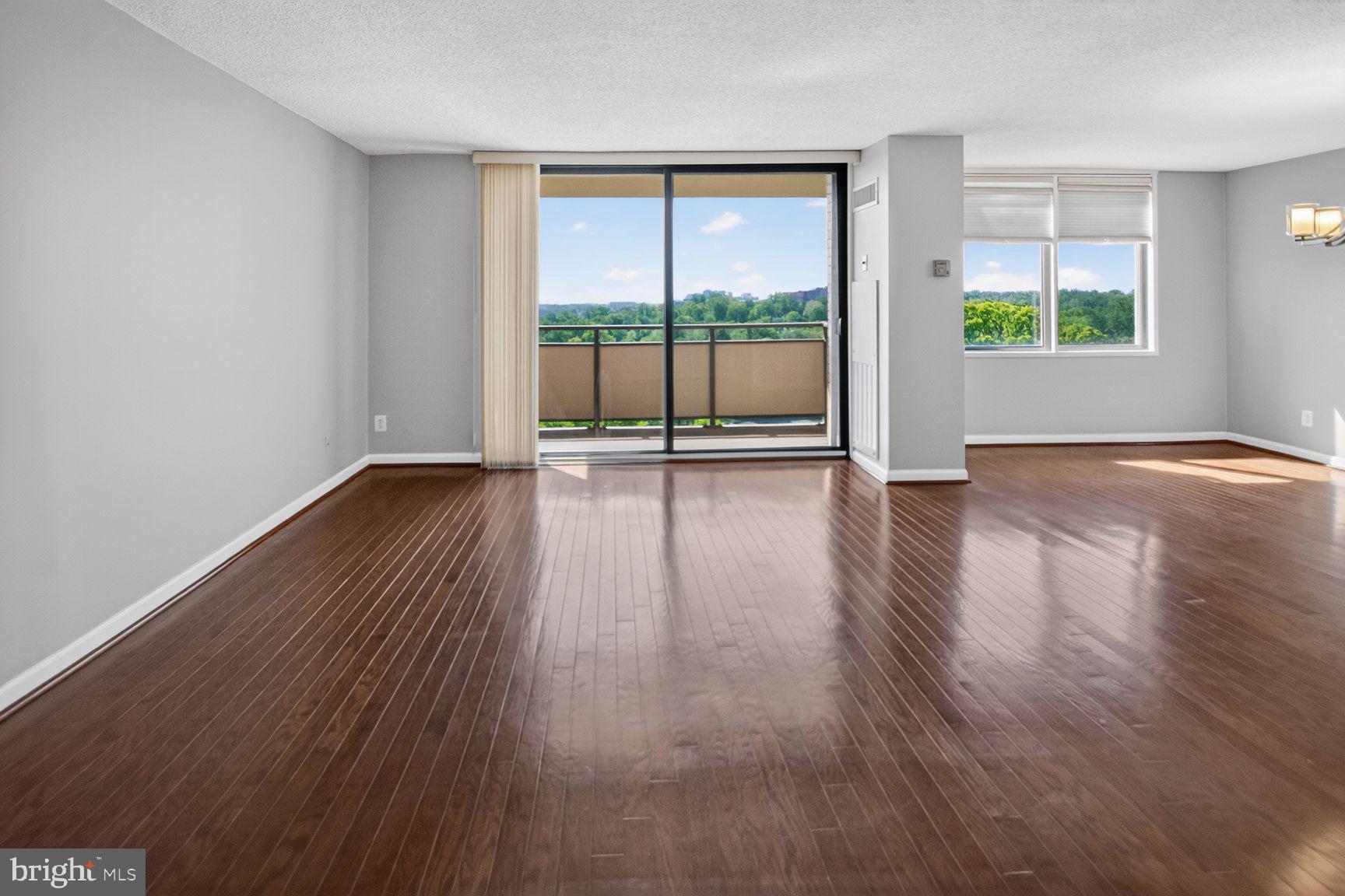5225 Pooks Hill Road, Unit 1404S Bethesda, MD 20814 - Photo 3 of 29 Living Room w/Balcony