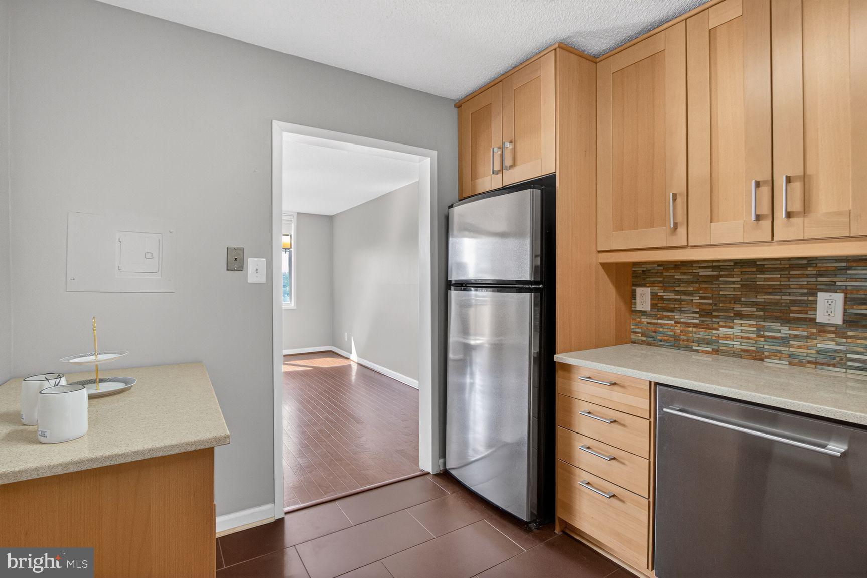 5225 Pooks Hill Road, Unit 1404S Bethesda, MD 20814 - Photo 9 of 29 Kitchen with side custom island