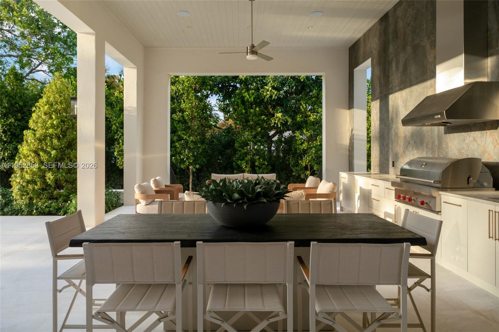 5901 Southwest 107th Street Pinecrest, FL 33156 - Photo 34 of 47 a view of a dining room with furniture window and outside view