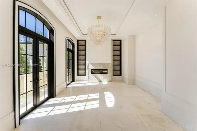 a view of a hallway with windows