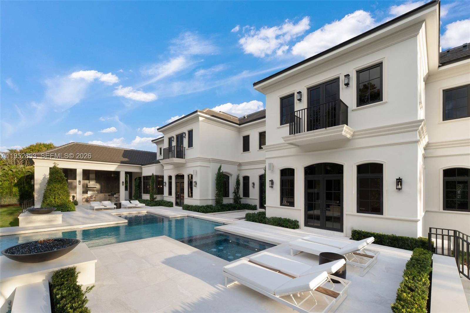 5901 Southwest 107th Street Pinecrest, FL 33156 - Photo 41 of 47 a view of a building with a patio