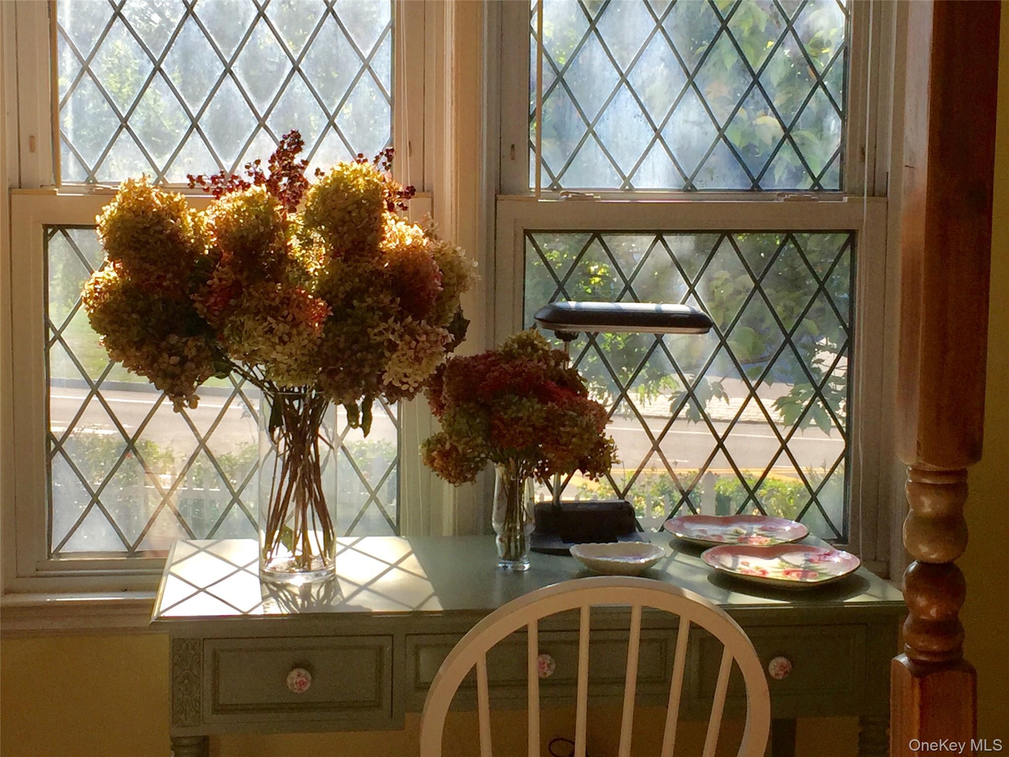 1155 Webster Avenue New Rochelle, NY 10804 - Photo 14 of 35 a vase of flowers sitting on a table