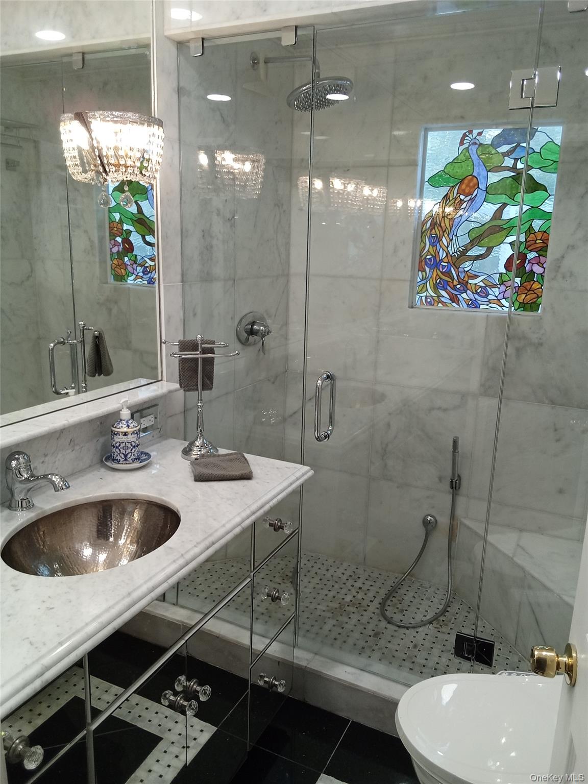 1155 Webster Avenue New Rochelle, NY 10804 - Photo 22 of 35 a bathroom with a sink mirror and toilet