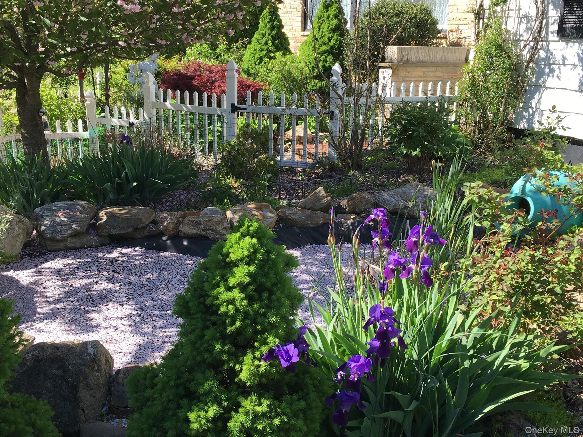 1155 Webster Avenue New Rochelle, NY 10804 - Photo 6 of 35 a view of a flower arrangement in backyard