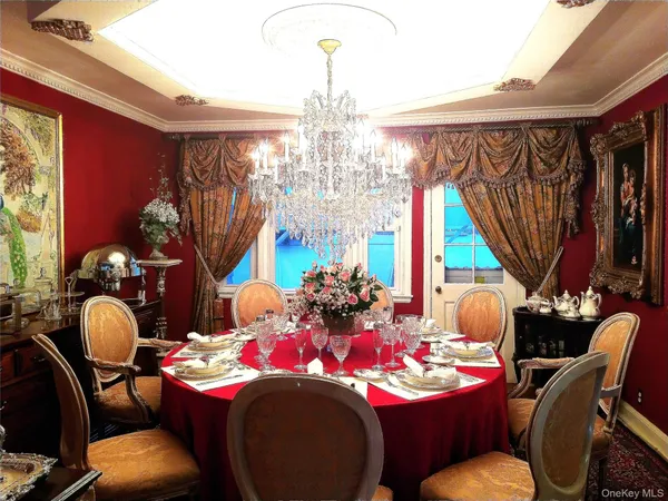 a dining room with furniture and window