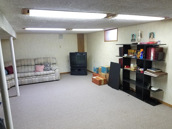 85 Birch Road Longmeadow, MA 01106 - Photo 23 of 26 a bedroom with furniture and a flat screen tv