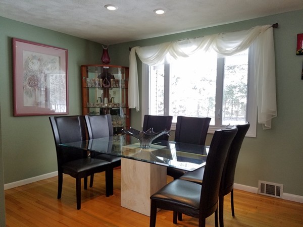 85 Birch Road Longmeadow, MA 01106 - Photo 9 of 26 a view of a dining room with furniture window and wooden floor