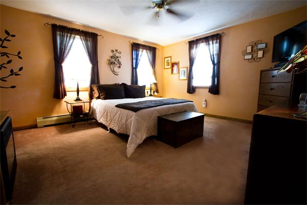 532 A Hubbardston Road Princeton, MA 01541 - Photo 15 of 20 a bedroom with a bed and a flat tv screen on dresser