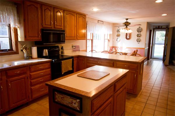 532 A Hubbardston Road Princeton, MA 01541 - Photo 6 of 20 a kitchen with a stove a sink and a microwave
