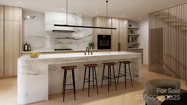 a kitchen with stainless steel appliances granite countertop a sink a refrigerator and a stove