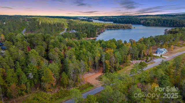 a view of lake with green space