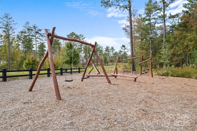 a view of park with a slide