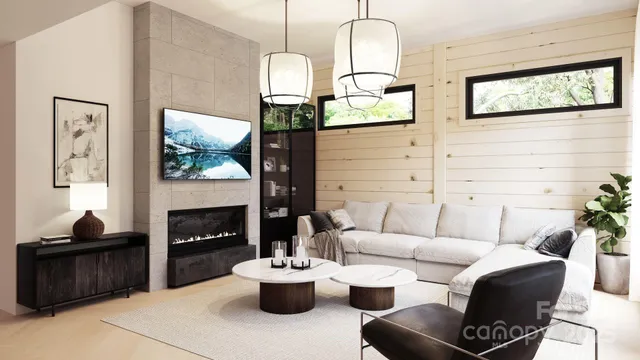 a living room with furniture fireplace and window